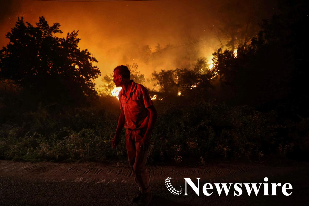 2026-07-04T230327Z_768515361_RC2B7MAX4SYW_RTRMADP_3_EUROPE-WEATHER-GREECE-WILDFIRE.JPG